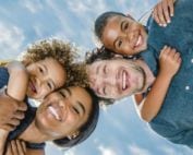 Multiracial family of four - wife, husband, son, daughter