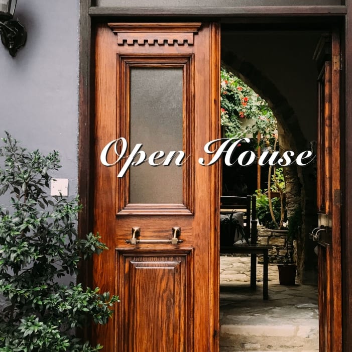 Image of a beautiful entryway in an Aix-en-Provence home with the words "Open House"