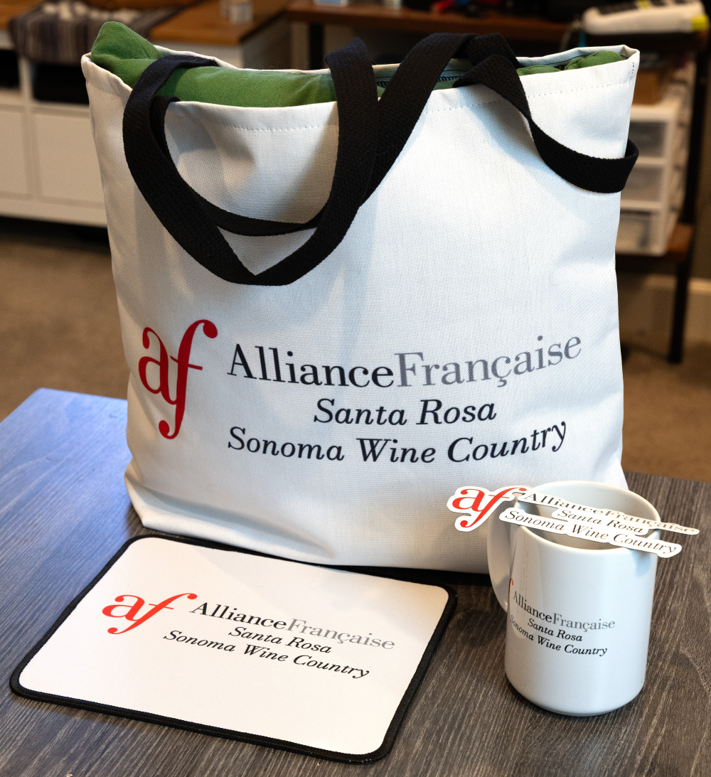 AFSR Merch preview: tote bag, mouse pad, and mug 